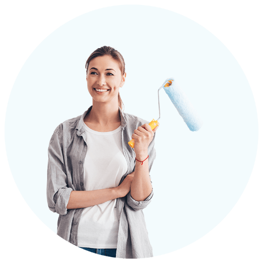 woman holding paintbrush